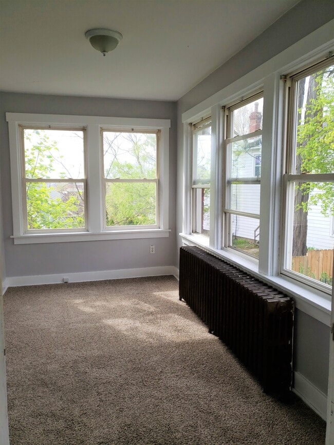 Enter the 1st floor level duplex to this fabulous sun-room offering tons of sunshine - 201 Richbarn Rd