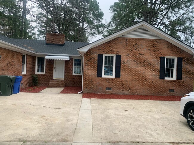 Brick Ranch - Two car garage, 4 bedrooms + 2 baths - 1200 Raleigh Rd Pkwy W