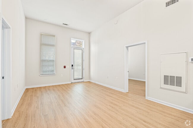 2BR, 2BA - 1,020SF - Living Room, DIning - The Clarendon