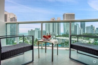 Building Photo - 19370 Collins Ave