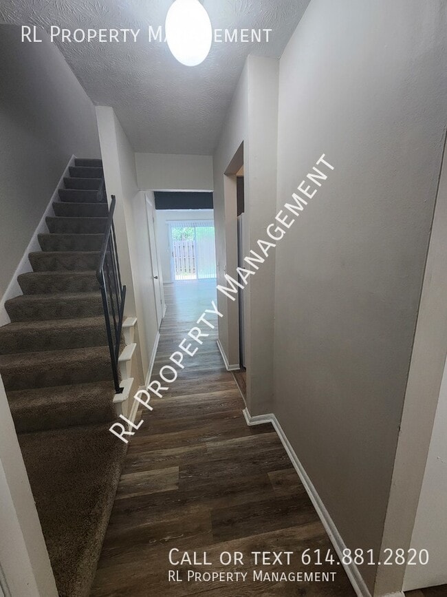 Building Photo - Cozy 2 bedroom 1.5 bathroom condo in Barce...