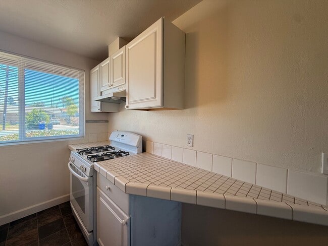 Building Photo - Charming 3BR Home with Spacious Yard in El...