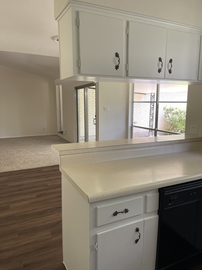 From kitchen to dining area. So much natural light. - 3407 Aldwyche Dr
