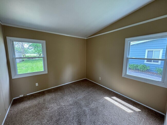 Building Photo - Spacious 3 Bedroom Home in Milan with Large Yard and Garage