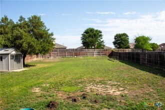 Building Photo - 511 Cowhand Dr