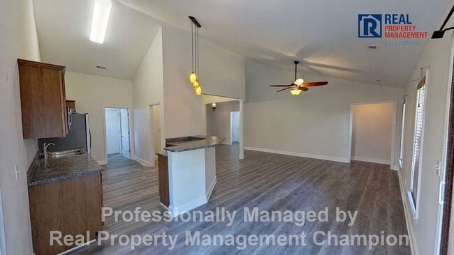 Building Photo - 3BD/2BA home w/vaulted ceilings, fireplace, 2-car garage, deck and fenced backyard