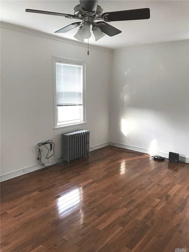 Building Photo - 119-40 7th Ave