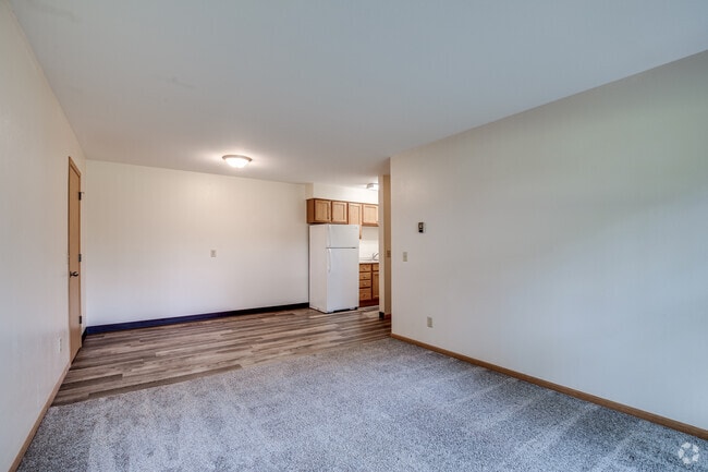 2BR, 1BA - 660SF -Living Room Dining Room - The Maples Apartments