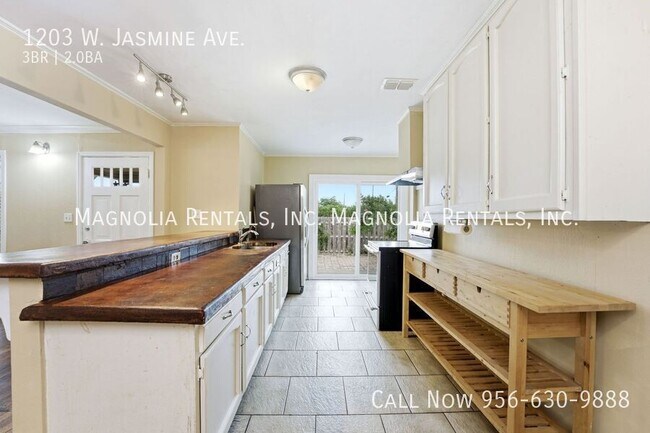 Foto del edificio - 1203 Jasmine Ave W