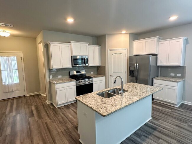 Building Photo - Stunning 4-Bedroom Home in Sawgrass at Wes...