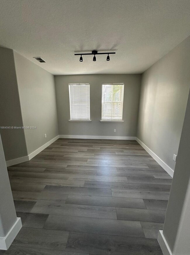 Building Photo - 10981 NW 48th Ter
