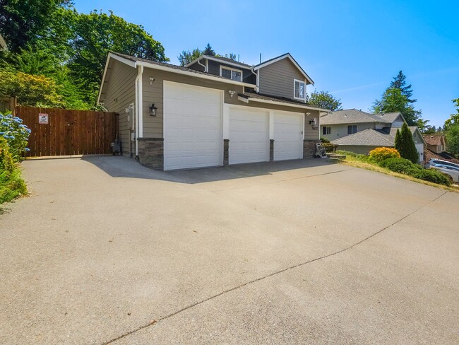 Building Photo - Spacious Remodeled Home with 3 Car Garage,...