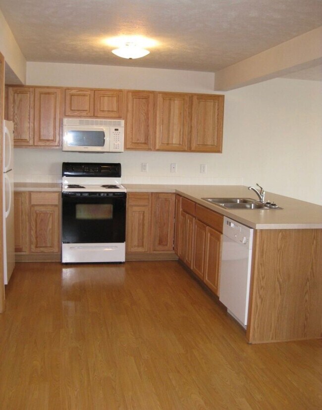 Building Photo - Renter's Dream with Triple Car Garage