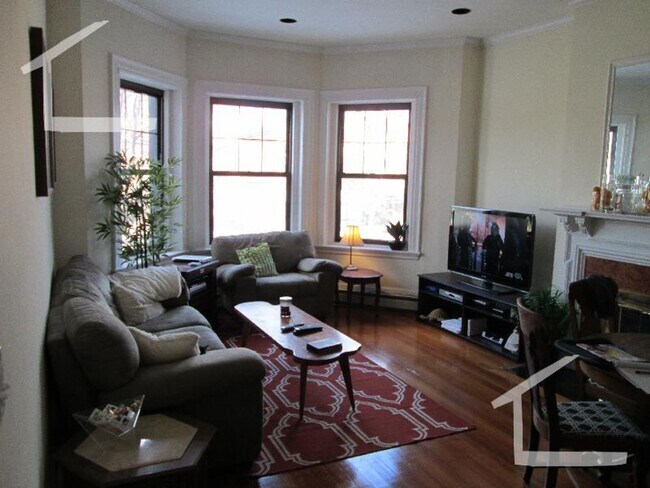 Building Photo - Washington Sq. Location. 3 Full Bathrooms, Porch, Central Heat/AC