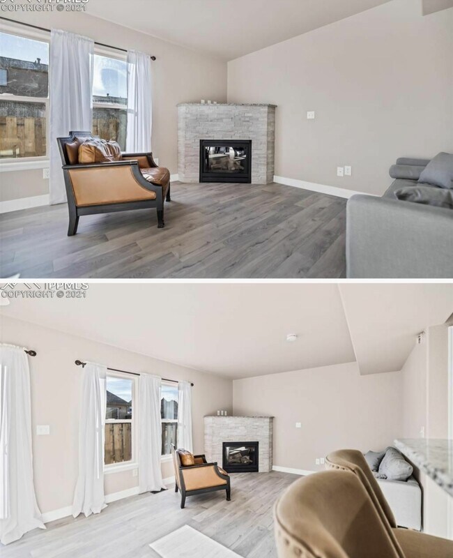 Living room with gas fireplace, small fenced patio off back with huge greenway behind - 5518 Sunshade Pt