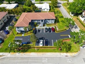 Building Photo - 10687 Royal Palm Blvd