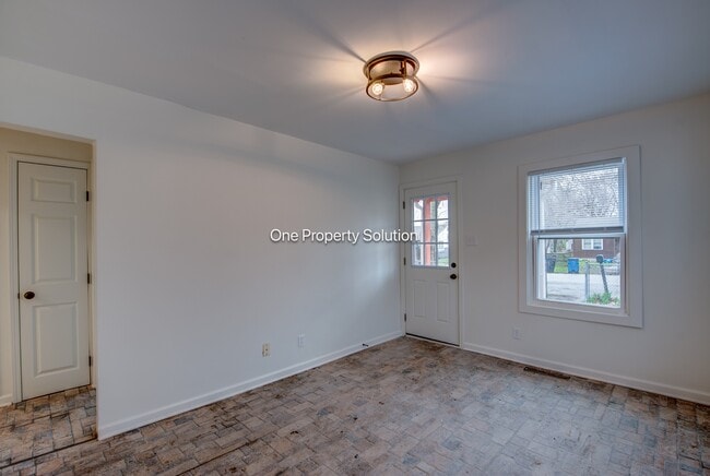 Building Photo - 1665 W 40th Ave