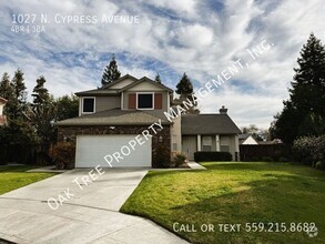 Building Photo - 1027 N Cypress Ave