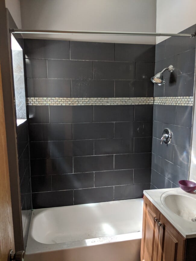 Bathroom with bathtub, sink, toilet - 3744 W Eastwood Ave