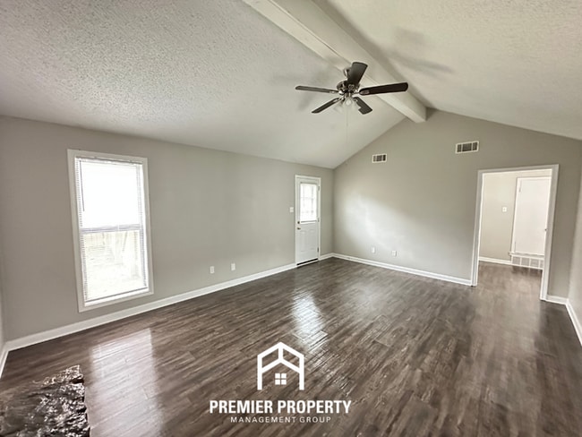 Photo - Quiet 3BR/2BA Cove Near Southwind | Soaring Ceilings & Floor-to-Ceiling Stone Fireplace House