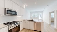 Located at 6535 Alvarado Road in San Diego, CA, this well-designed 1-bedroom, 1-bathroom unit offers a clean, modern aesthetic throughout its efficiently organized single-floor layout. The open-concept kitchen and living area serves as the heart of the space, featuring sleek white cabinetry, a subway tile backsplash, quartz countertops, and a peninsula with an undermount sink. Stainless steel appliances — including a gas range, over-the-range microwave, dishwasher, and side-by-side refrigerator — complete the kitchen. Recessed lighting and light wood-style flooring extend throughout, creating a bright and cohesive atmosphere. The living area benefits from natural light streaming in through large windows. The bedroom is a comfortable, well-proportioned retreat equipped with a ceiling fan, dual windows with views of the surrounding neighborhood, and direct access to a walk-in closet outfitted with multi-tiered shelving and hanging rods. The bathroom offers a clean, minimalist design with a floating white vanity, quartz countertop, and a large wall mirror. Consistent light wood flooring and a crisp white palette throughout the entire unit lend the space a fresh, contemporary feel.