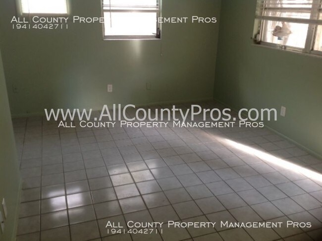 Building Photo - 5212 Royal Palm Ave