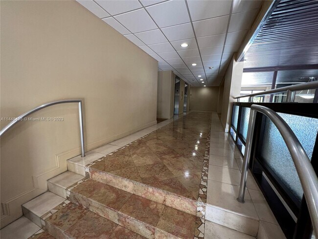 Building Photo - 3375 N Country Club Dr