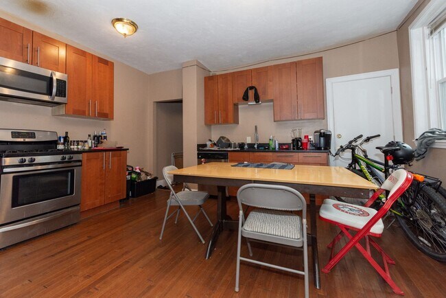 Building Photo - Large 5 bedroom, 2 full baths, right on the T!