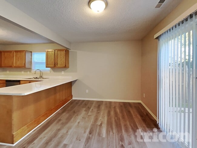 Building Photo - 7114 Mars Dr