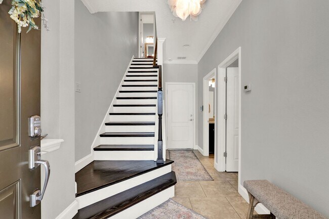 Building Photo - Stunning 3/3.5 Baldwin Park Townhome with 2-Car Garage & Upgrades Galore!