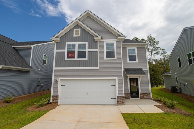 Building Photo - Spacious 4-Bedroom Home - Convenient to Fo...