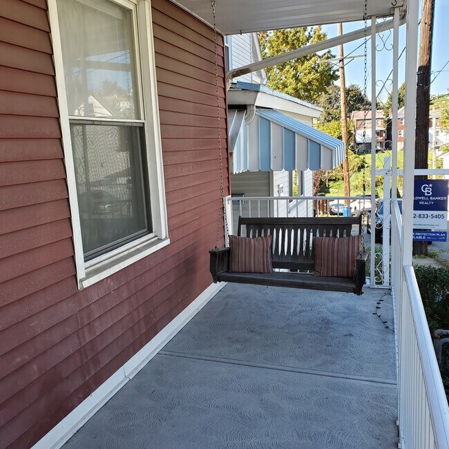 Front Porch with Swing - 1134 Trost Ave