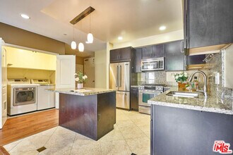 Building Photo - 401 N Serrano Ave