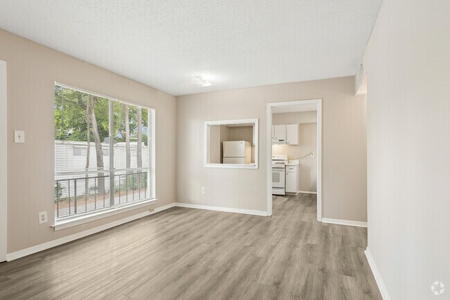 2 habitaciones, 1 baño - 750 pies cuadrados - Sala de estar - The Grove at Patterson