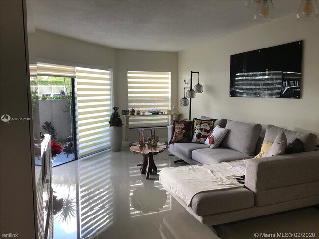 Foto del edificio - 2 br, 2 bath Condo - 8810 SW 132nd Pl # 108DN
