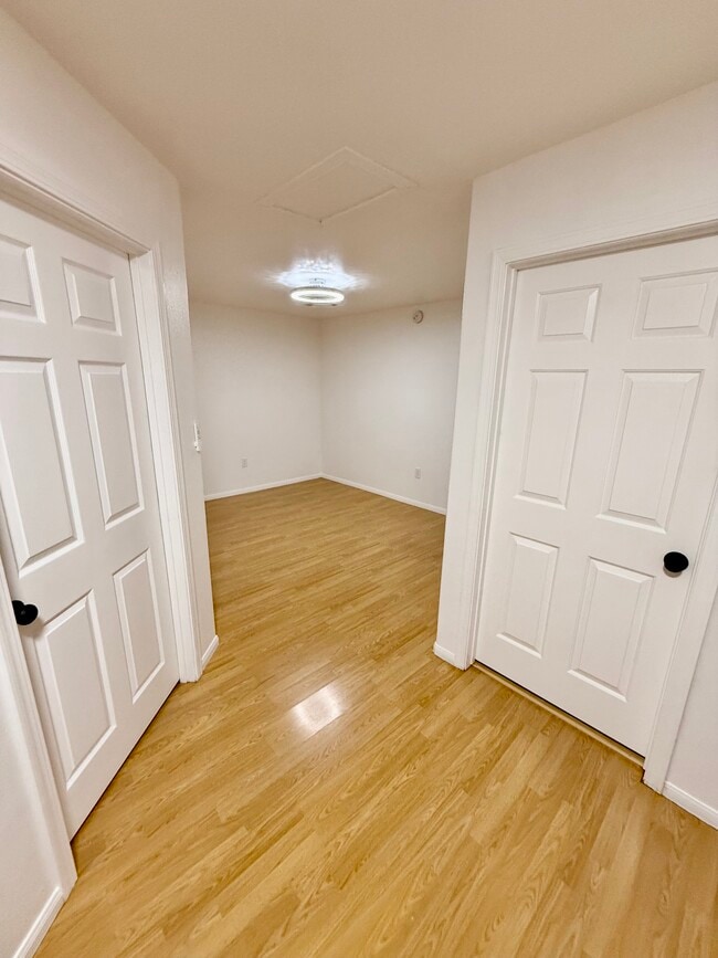 Living room and entrance to bedroom and bathroom - 9845 Rosecrans Ave