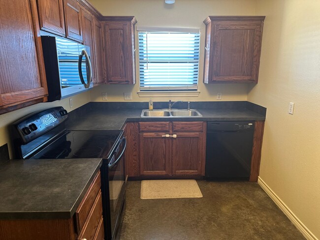 Building Photo - Unusual place but GREAT apartment! Gated &...