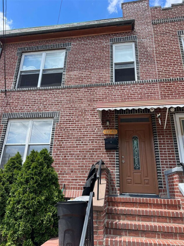 Building Photo - 60-43 60th Dr