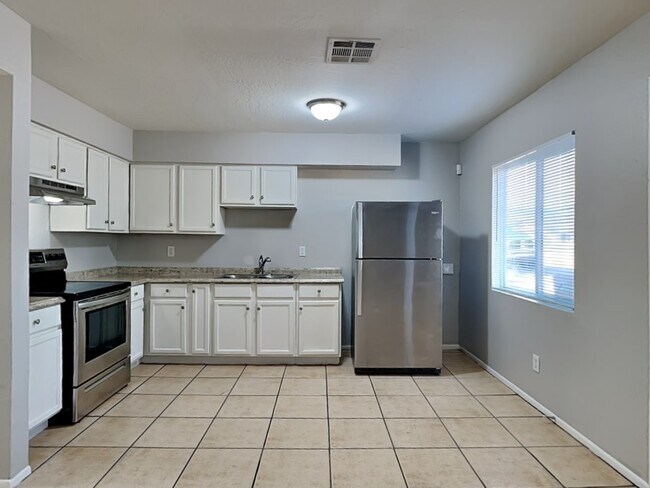 Building Photo - 9011 S 8Th Pl Unit 1