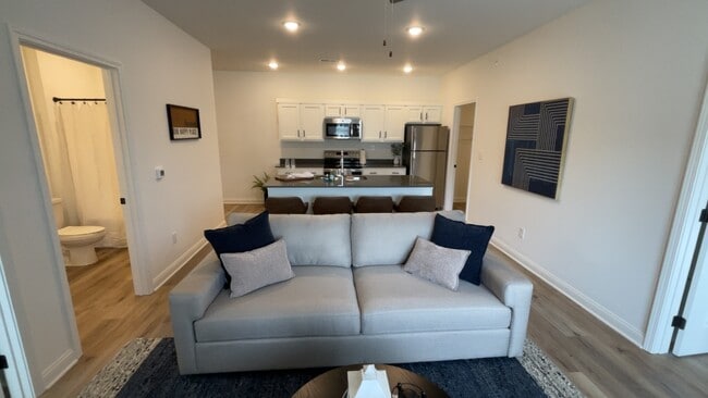 Living Room and Kitchen - Gated Villa Apartments at Kearney