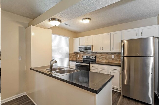 Foto del edificio - 5936 Loch Arbor Ln