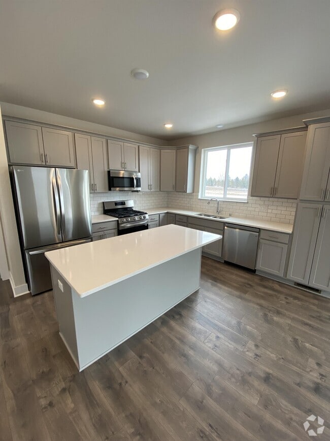 Building Photo - W218N16014 Tiger Lily Dr