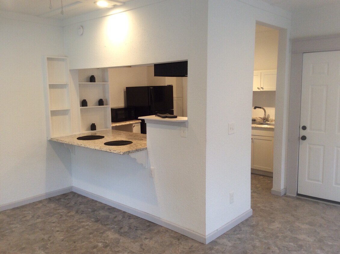 Living Overlooking Kitchen/Bar - 919 Phillips St