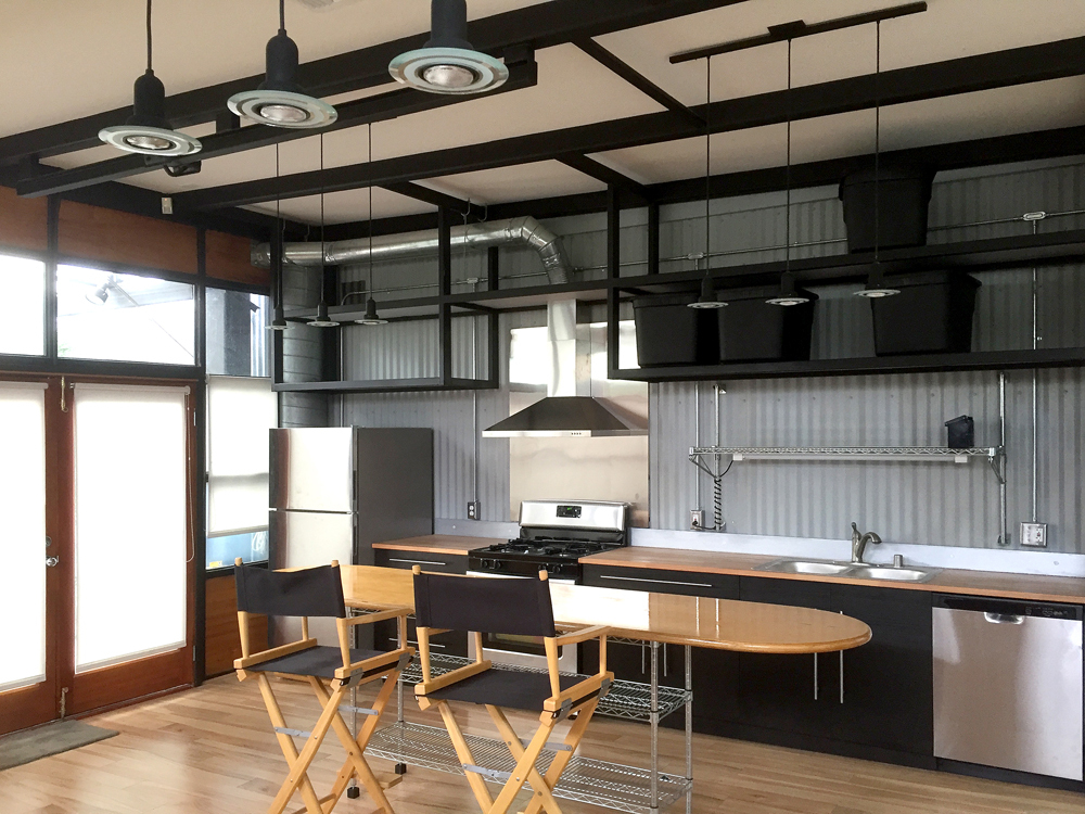 Kitchen with long snack table - 12915 Greene Ave