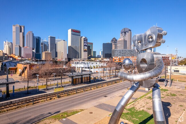Traveling Man, in Deep Ellum, is a trio of sculptures made by Brad Oldham.