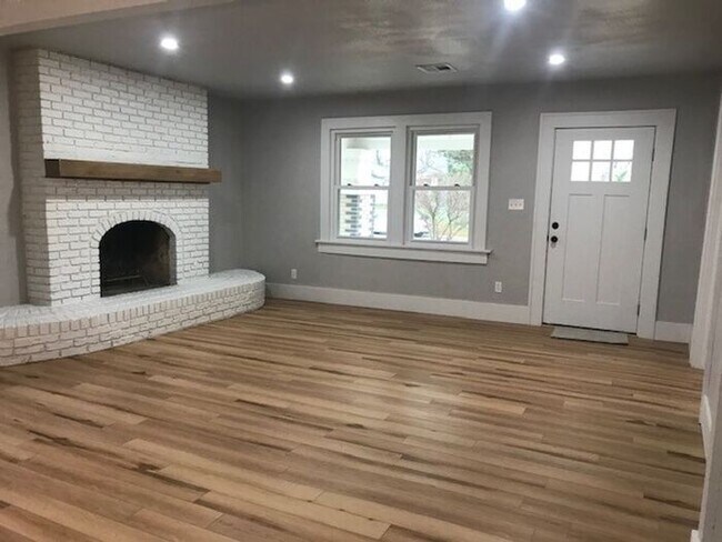 Building Photo - Updated Home - Wood Floors