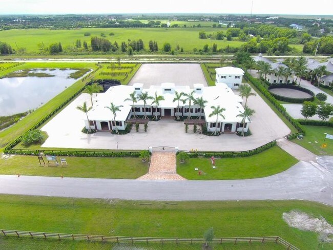 Building Photo - 14878  Grand Prix Village Drive