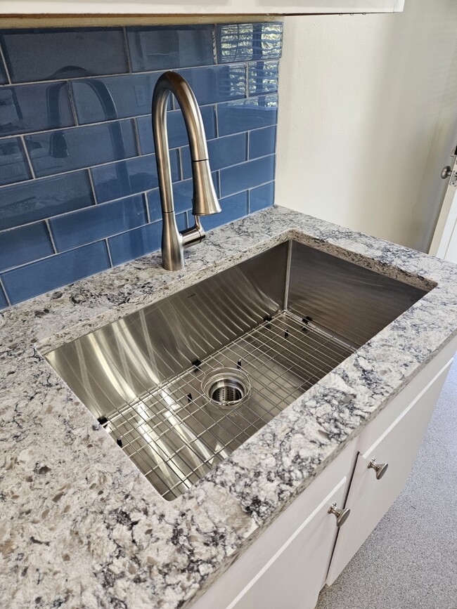 New 30" Kraus sink - 5058 Colfax Ave