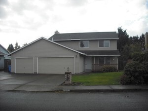 Primary Photo - Huge deck, triple car garage/RV parking, storage