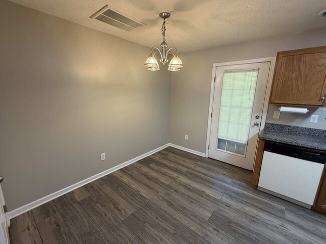 Building Photo - FOUNTAIN CITY: GROUND LEVEL 2 BEDROOM, 2 BATHROOM CONDO IN MAPLE CHASE